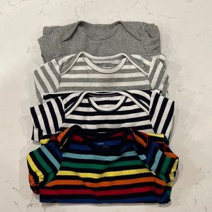 4 pack of long sleeves onsies, size 18-24 months.